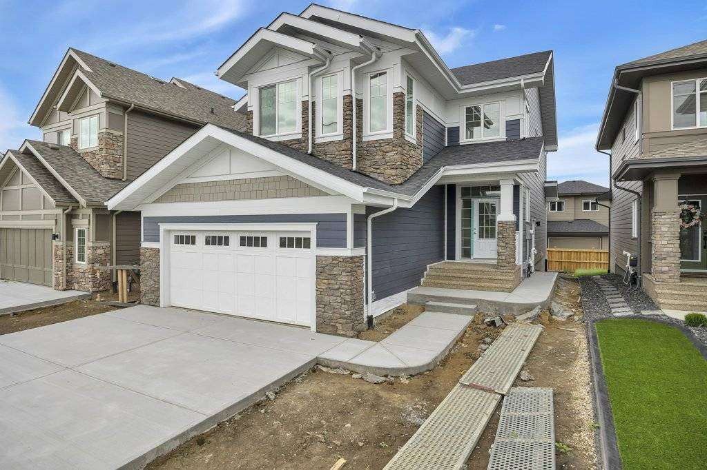 Luxury custom home builder in Edmonton Alberta crafting modern estate homes, High end custom home interior design in Edmonton by award winning builder, Custom acreage home builder in Alberta with luxury finishes, La Palouse luxury home in Jagare Ridge golf course community Edmonton, Modern urban infill custom home in Edmonton city core, Executive custom home under construction in Edmonton Alberta, Luxury home features including oversized garage dog wash and hidden rooms Edmonton, Custom home builder in Azur Beaumont Alberta, Custom home in Chapelle Gardens Southwest Edmonton, Luxury estate home in Jensen Lakes St Albert Alberta