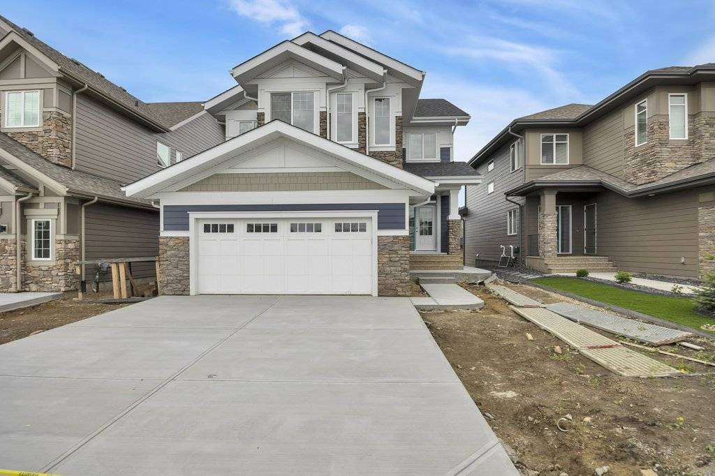 Luxury custom home builder in Edmonton Alberta crafting modern estate homes, High end custom home interior design in Edmonton by award winning builder, Custom acreage home builder in Alberta with luxury finishes, La Palouse luxury home in Jagare Ridge golf course community Edmonton, Modern urban infill custom home in Edmonton city core, Executive custom home under construction in Edmonton Alberta, Luxury home features including oversized garage dog wash and hidden rooms Edmonton, Custom home builder in Azur Beaumont Alberta, Custom home in Chapelle Gardens Southwest Edmonton, Luxury estate home in Jensen Lakes St Albert Alberta