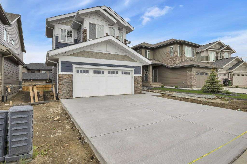 Luxury custom home builder in Edmonton Alberta crafting modern estate homes, High end custom home interior design in Edmonton by award winning builder, Custom acreage home builder in Alberta with luxury finishes, La Palouse luxury home in Jagare Ridge golf course community Edmonton, Modern urban infill custom home in Edmonton city core, Executive custom home under construction in Edmonton Alberta, Luxury home features including oversized garage dog wash and hidden rooms Edmonton, Custom home builder in Azur Beaumont Alberta, Custom home in Chapelle Gardens Southwest Edmonton, Luxury estate home in Jensen Lakes St Albert Alberta
